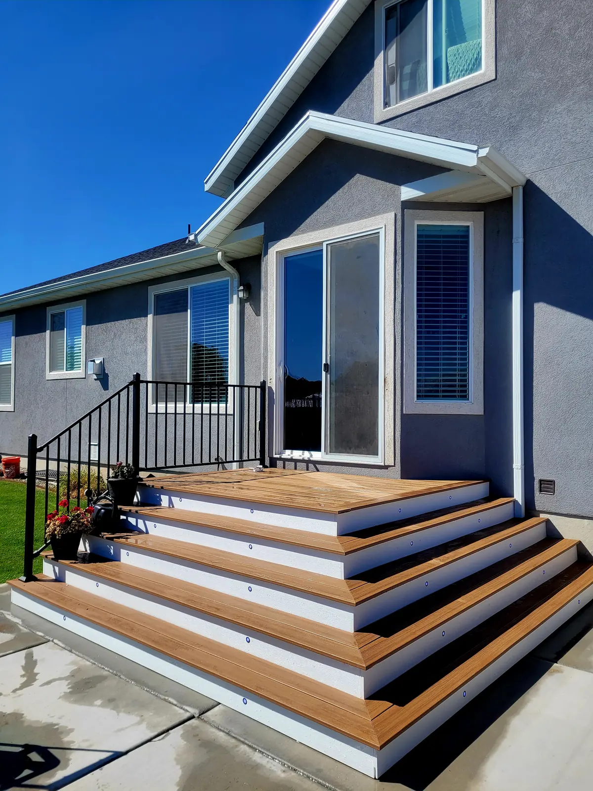 Cascading wrap-around stairs in two-tone composite