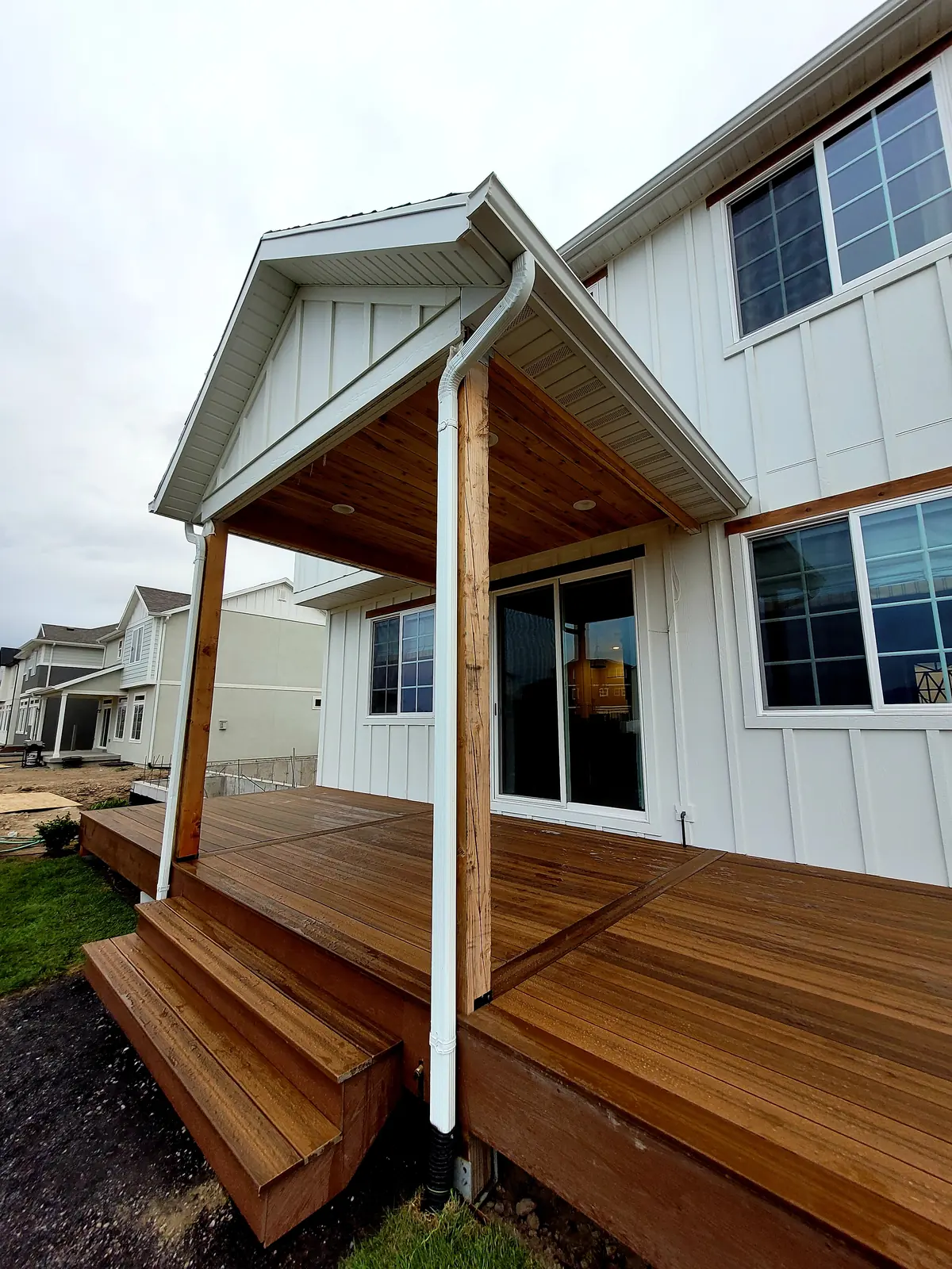 Gable roof with cedar soffit over a wood deck