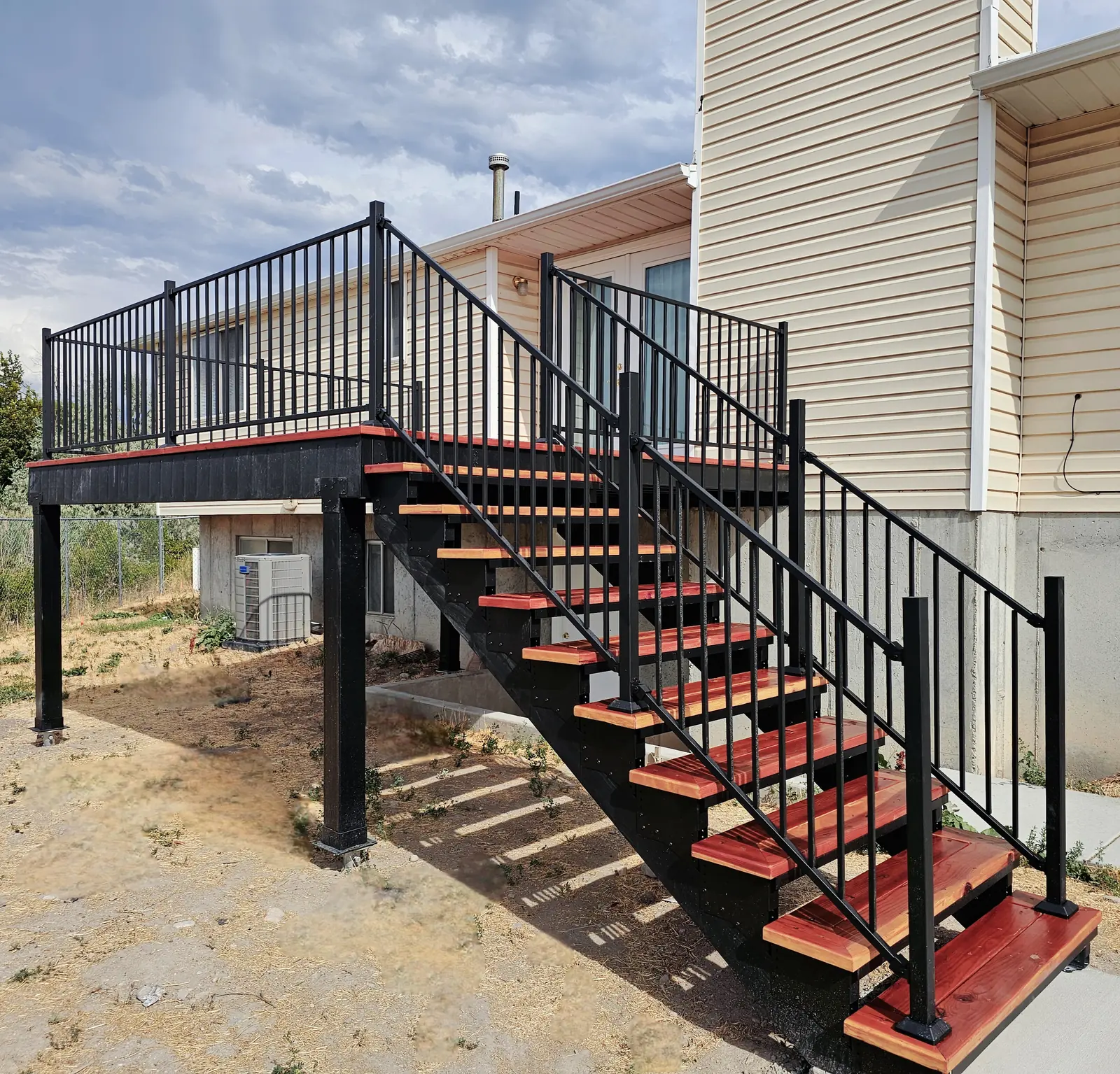 Steel-framed deck and stairs with hardwood treads