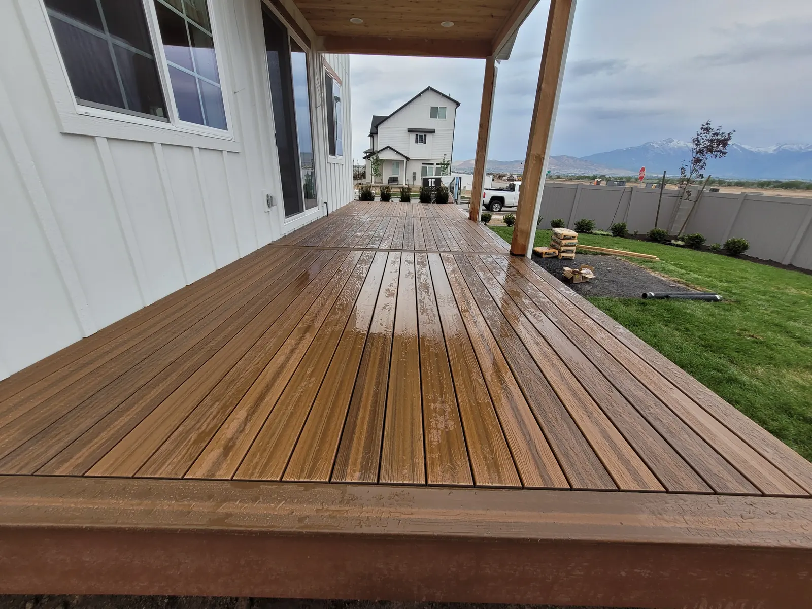 Finished deck boards and posts on the covered back deck