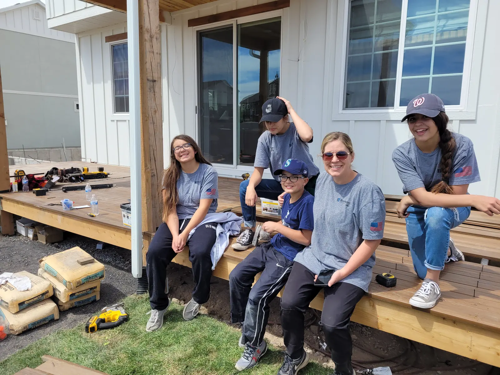 Levi Tippetts’ wife and daughters on the deck they built for the Utah Valley Parade of Homes