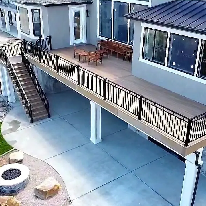 Elevated composite deck and stairs with custom fabricated railing from above
