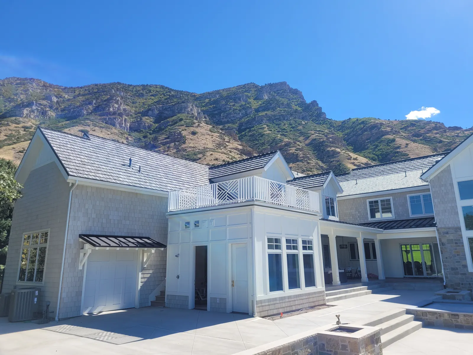 Provo home with an upper deck below the mountains