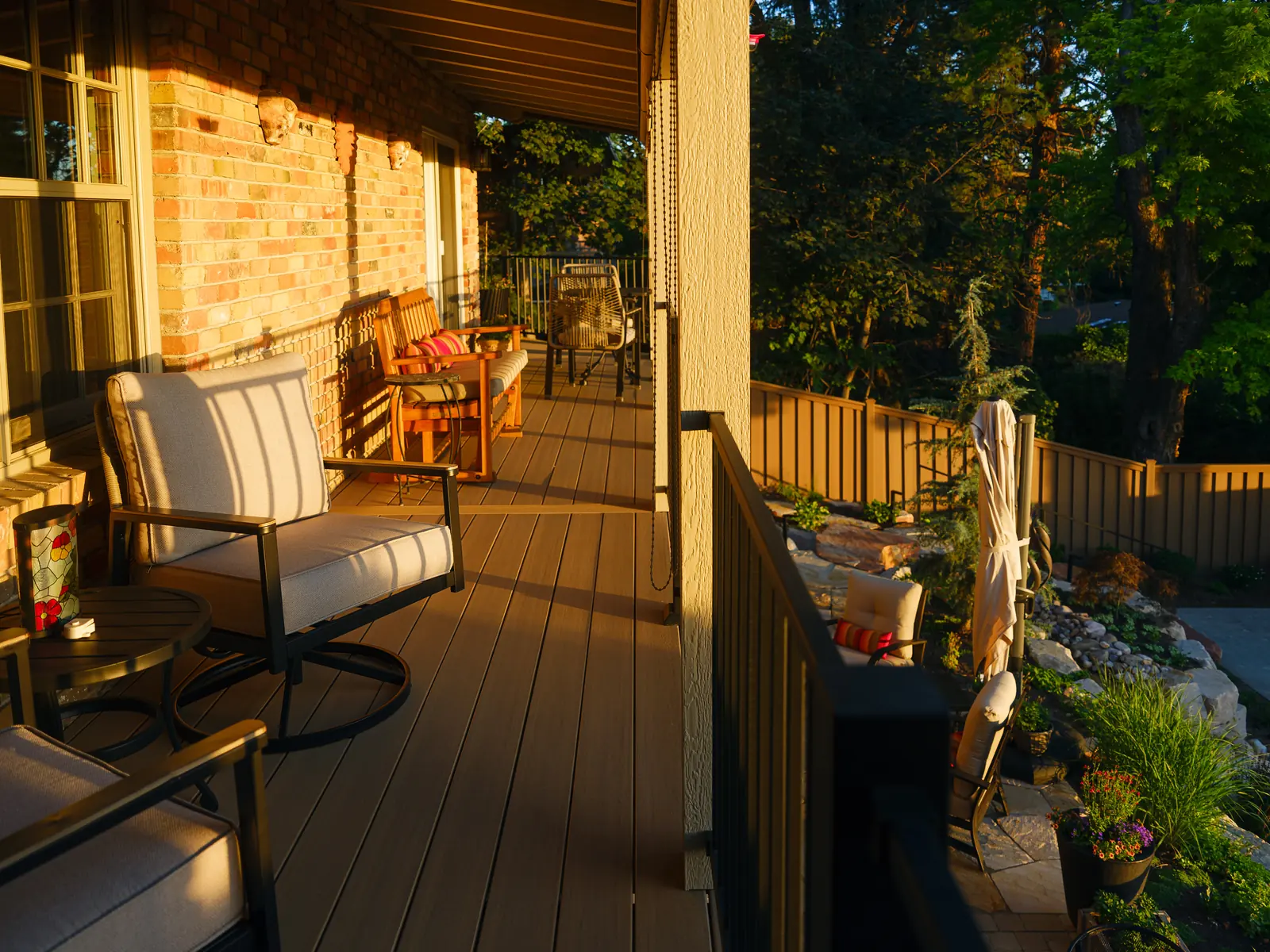 Seating area on a covered TimberTech Weathered Teak deck