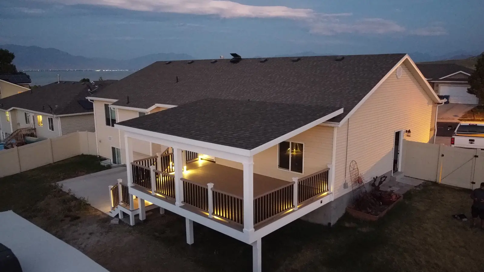 Covered TimberTech deck with lighting built by TC Decks in Saratoga Springs