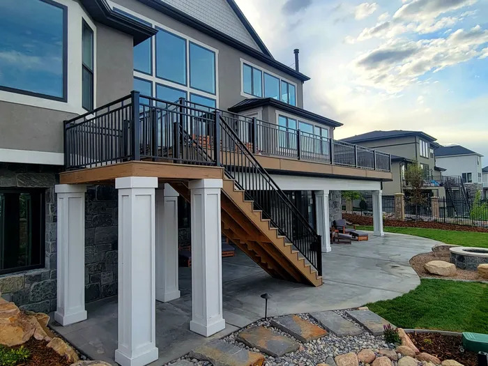 Explore grand architecture with TC Decks' stone building and balcony stairways.