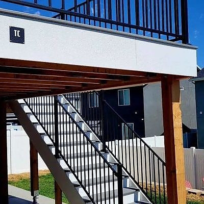 TC Decks designs stairways that lead to serene and stylish building settings.