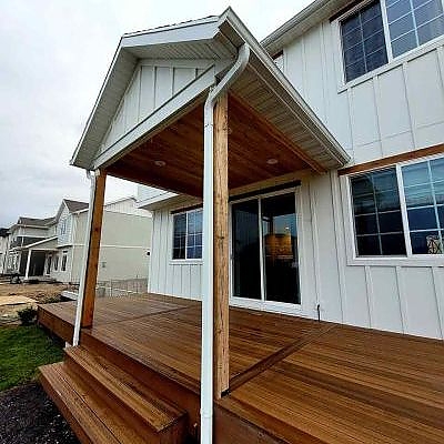 Enhance your home with a porch and window integration by TC Decks.