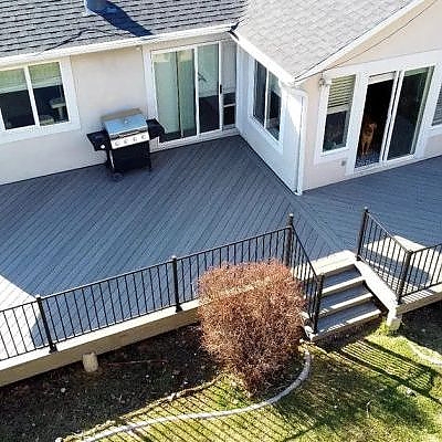 Driveway enhancements by TC Decks include stylish benches and car parking solutions.