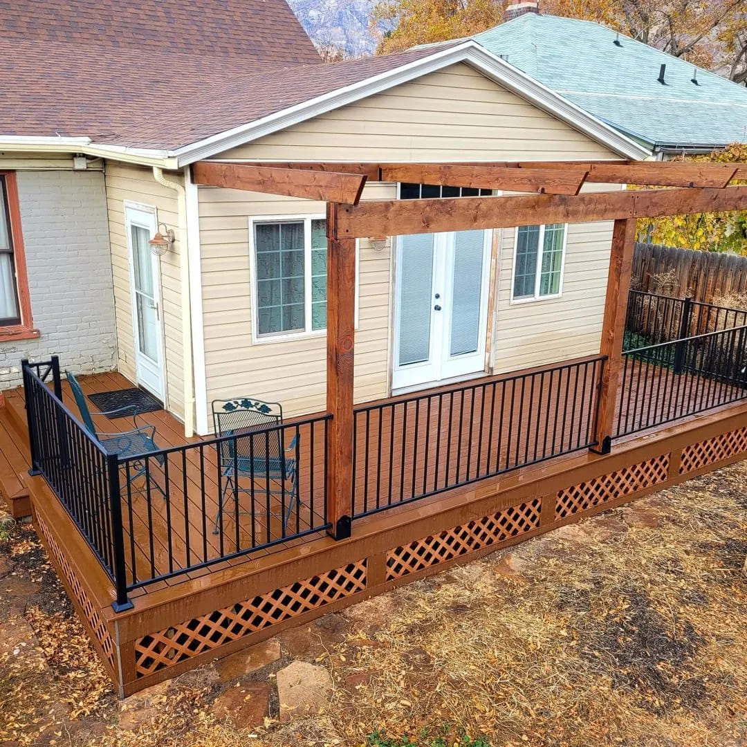 Wooden decks by TC Decks feature stylish fences and welcoming porches.