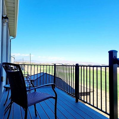 Tranquil patio views from balconies designed by TC Decks invite relaxation.