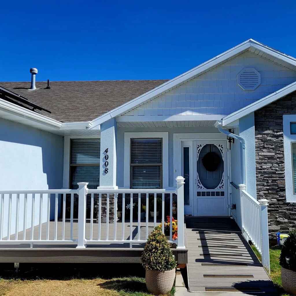 TC Decks enhances walkways beside houses for added curb appeal.